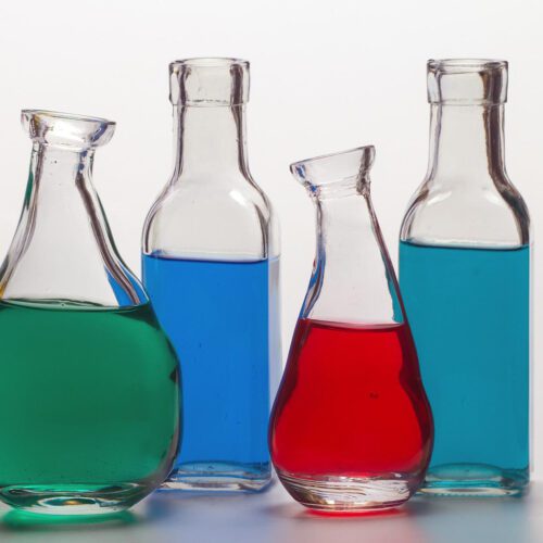 Test tubes and flasks with different coloured liquids in