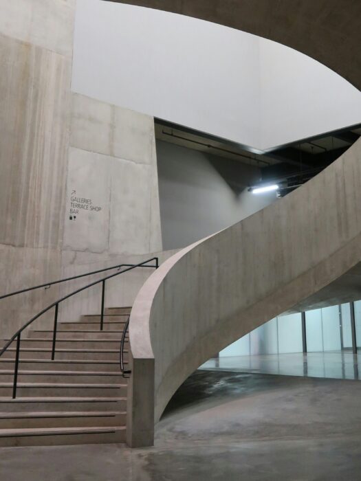 Curving concrete staircase, at the Tate Modern, in London.