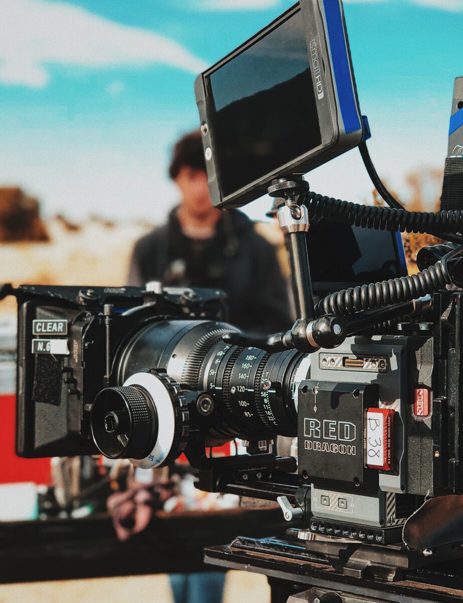 A professional film camera on an outdoor set with