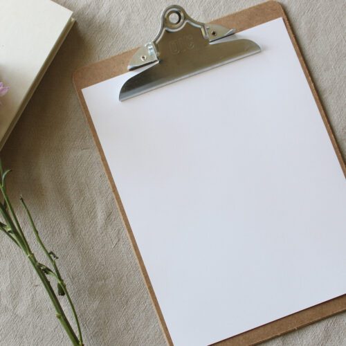 Blank paper on clipboard