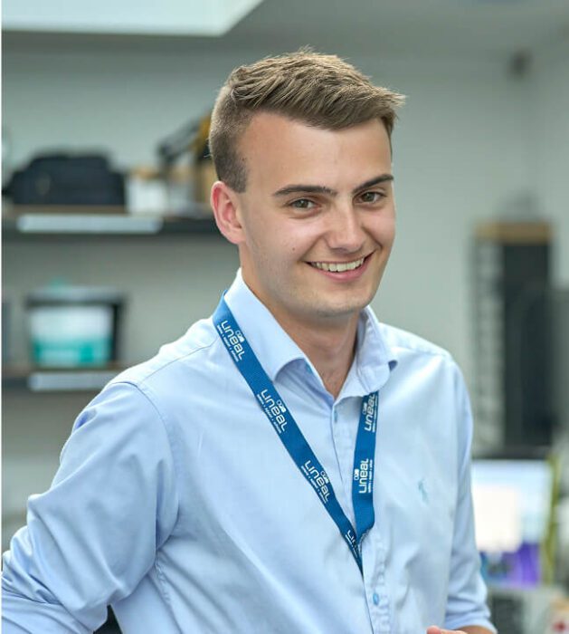 Alex Bunn profile shot in an office space
