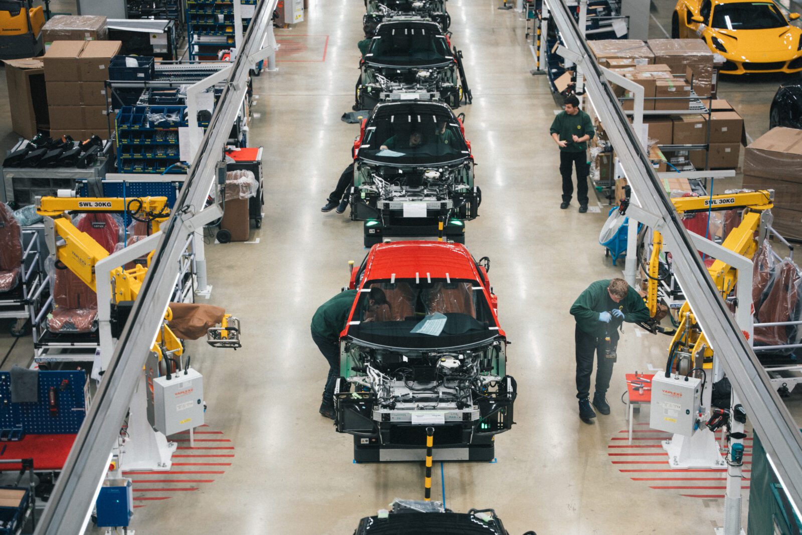 Row of electric vehicles in a car garage
