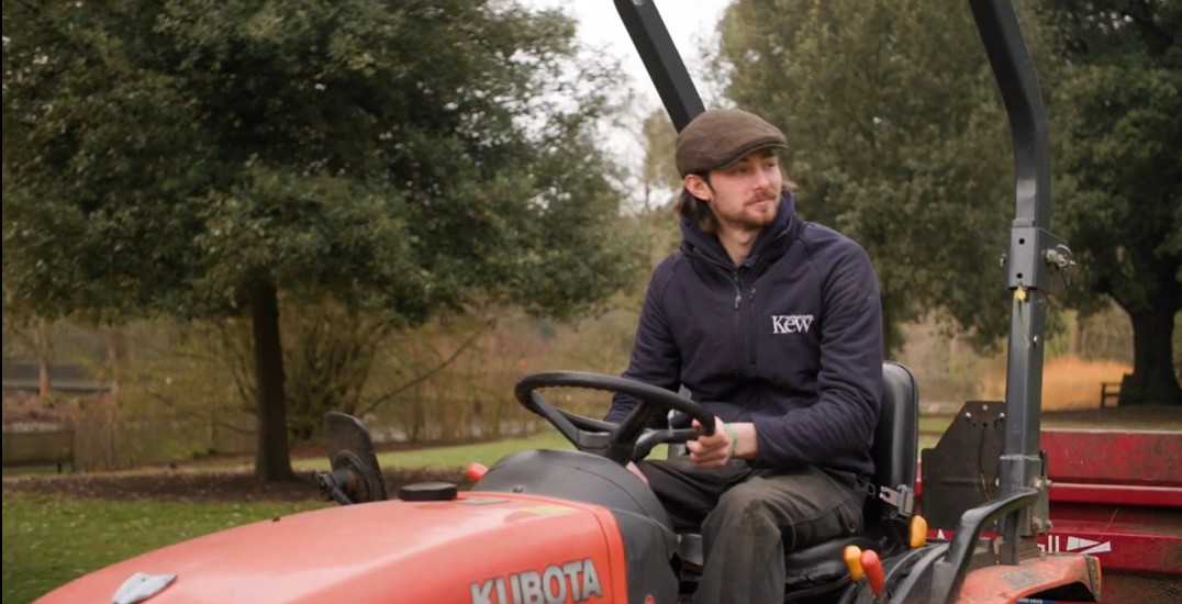Charlie on a riding mower